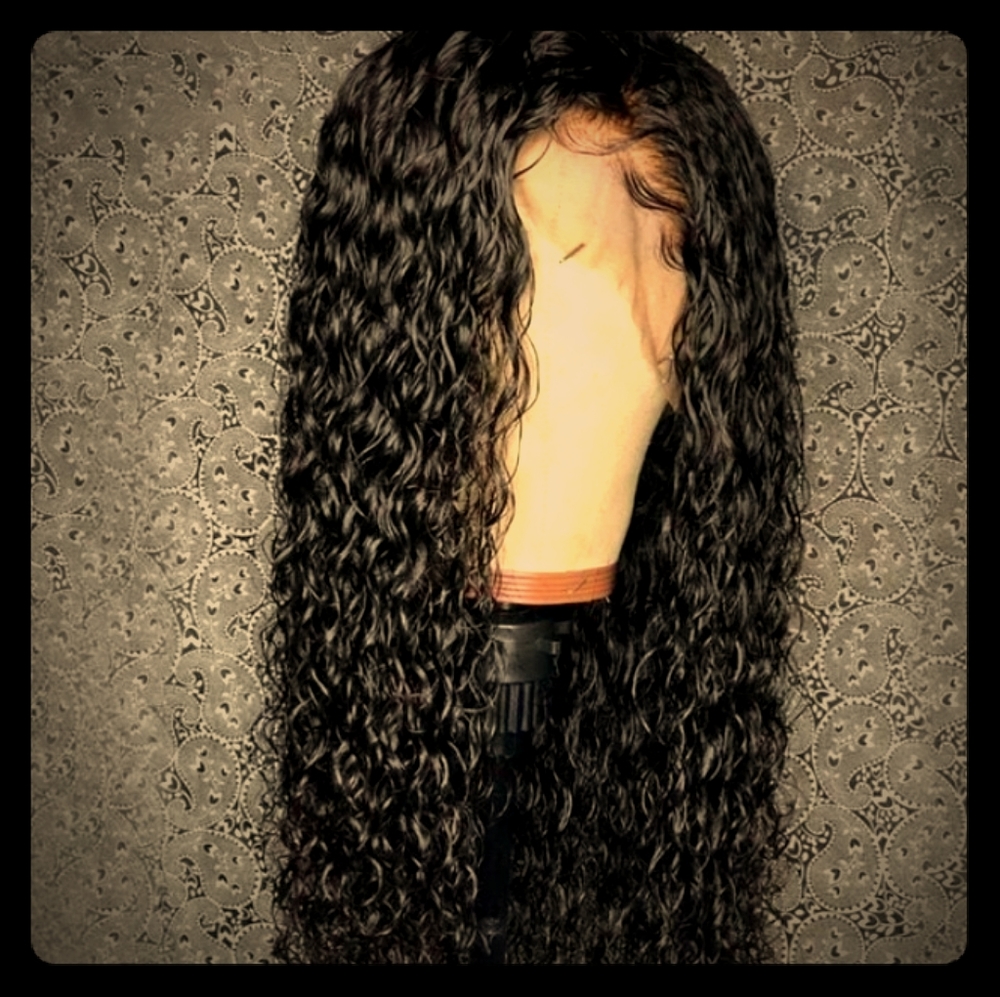 Wet&Wavy Brazilian. Jet black wig with baby hair